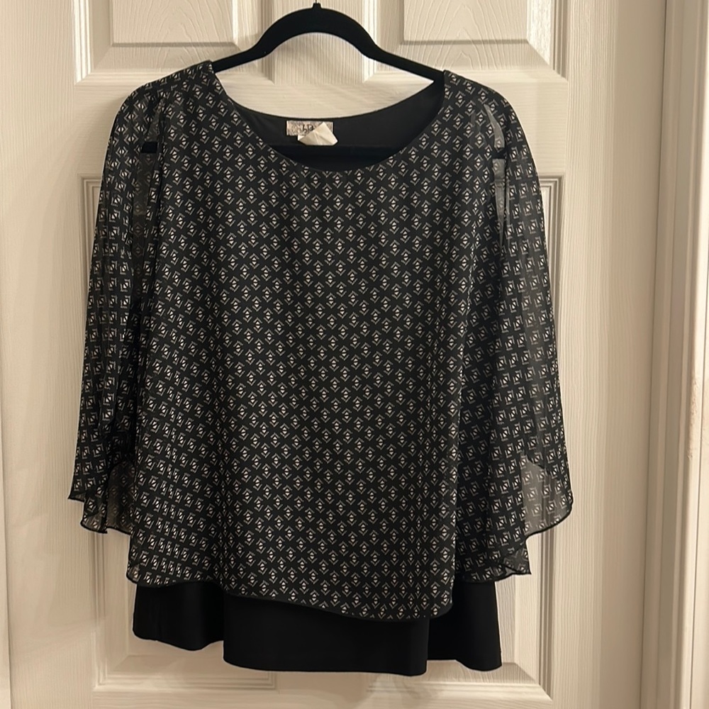 Dress shirt. Poncho style. Slits on the arms. size large